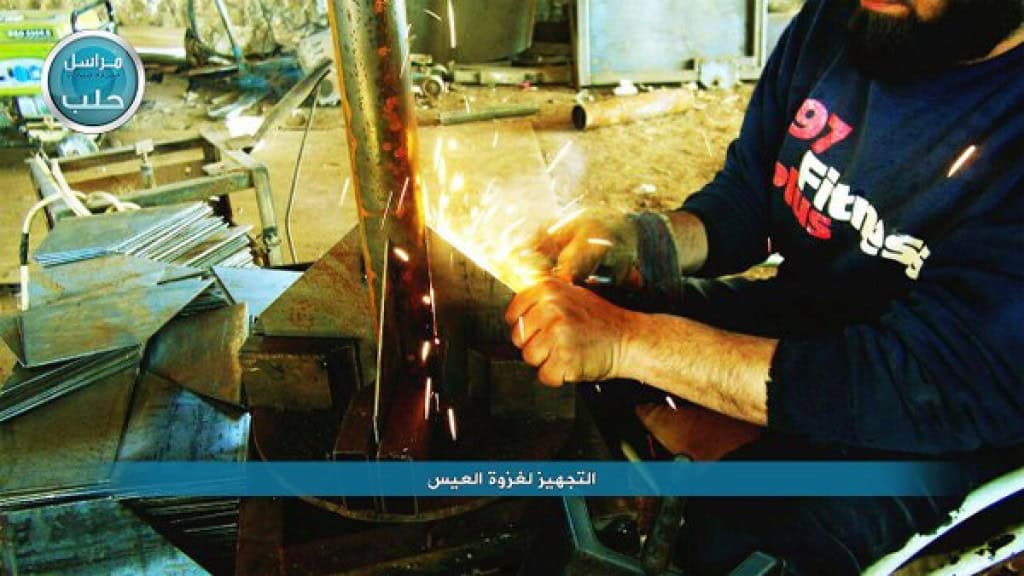 Nusrah Front Fighters preparing rockets 4