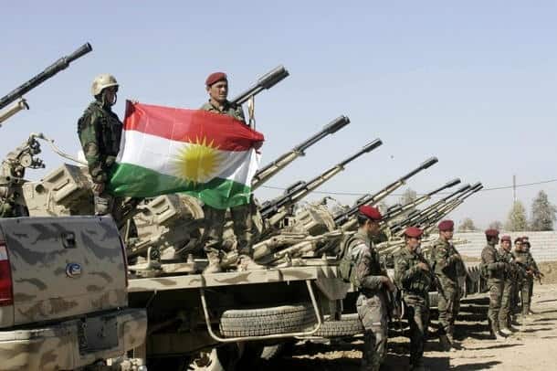 Tensions mount as Iraqi militias boost numbers in contested areas while Kurds hold referendum