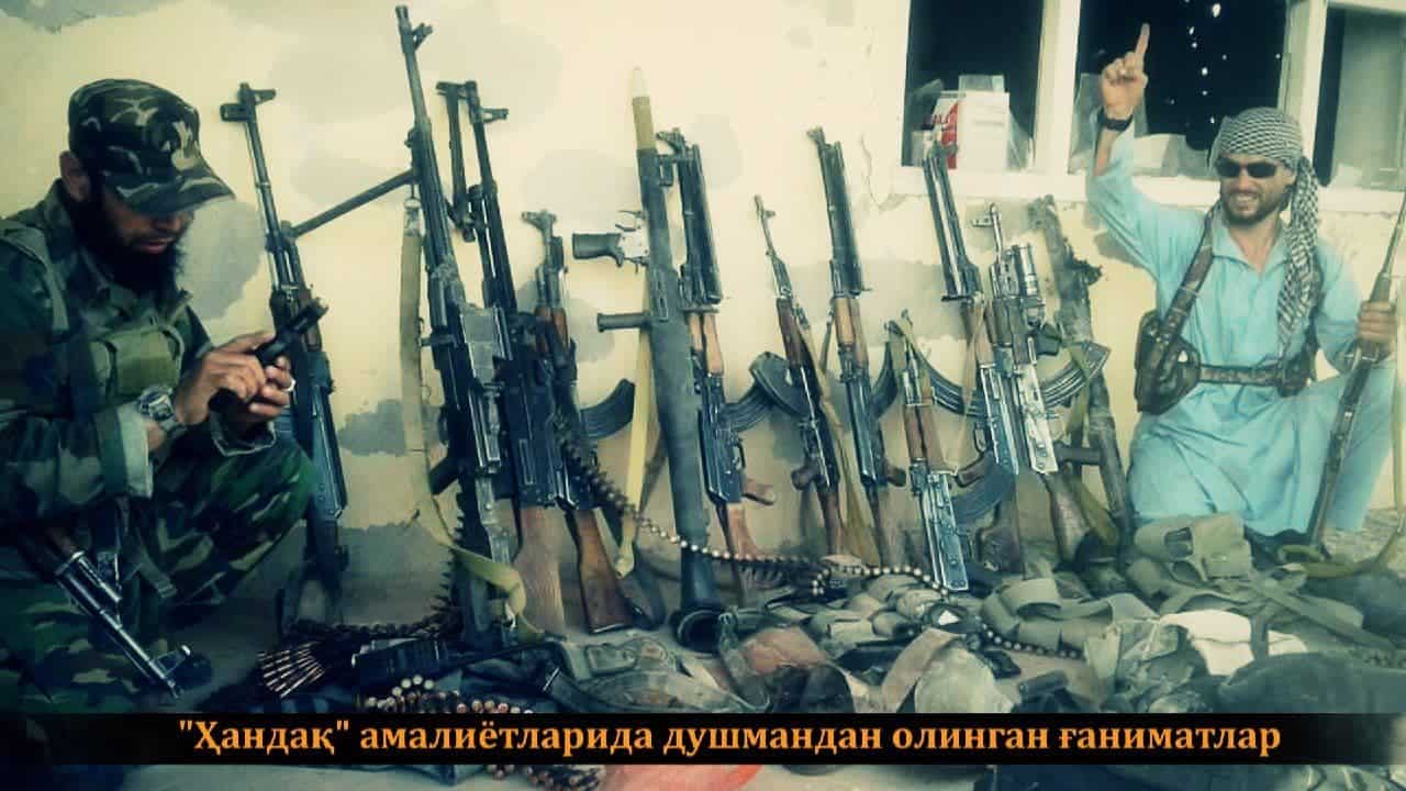 Uzbek group shows spoils from Afghan base