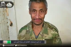 Photo 8. Shiite Afghan fighter taken prisoner in Sheikh Saeed, south Aleppo, by Sunni Islamist group Harakat Nour al Din al Zanki, part of the Islamist-led Jaish Fatah coalition.