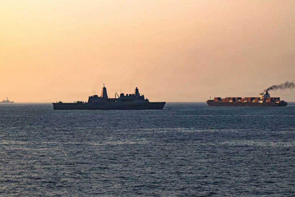 Iran claims strike on US warship as US attempts to reopen Strait of Hormuz